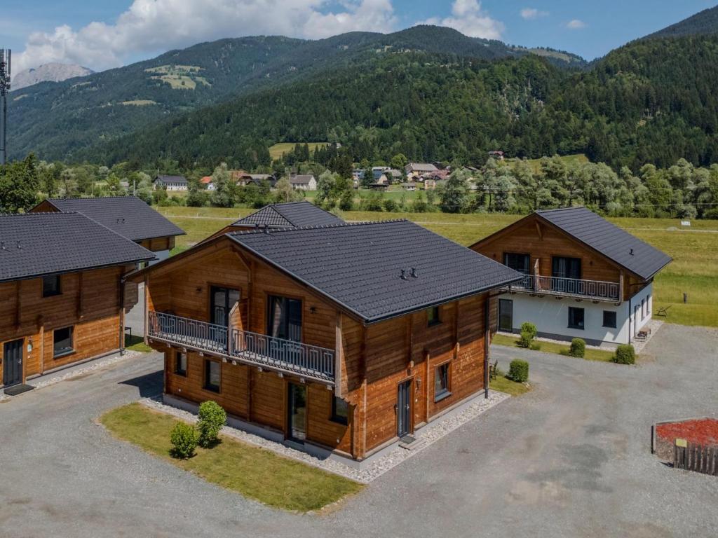 an aerial view of a home with mountains in the background at Rattendorf 20A in Rattendorf