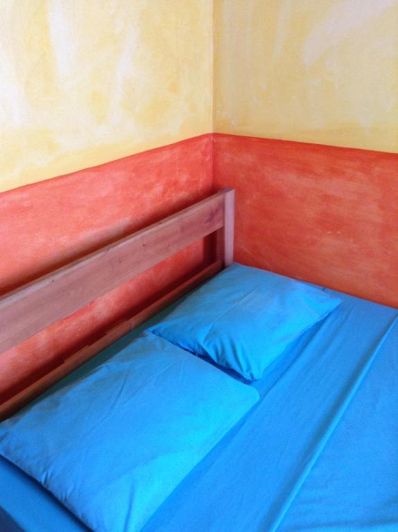 Voodi või voodid majutusasutuse Hostel Iguana Azul toas
