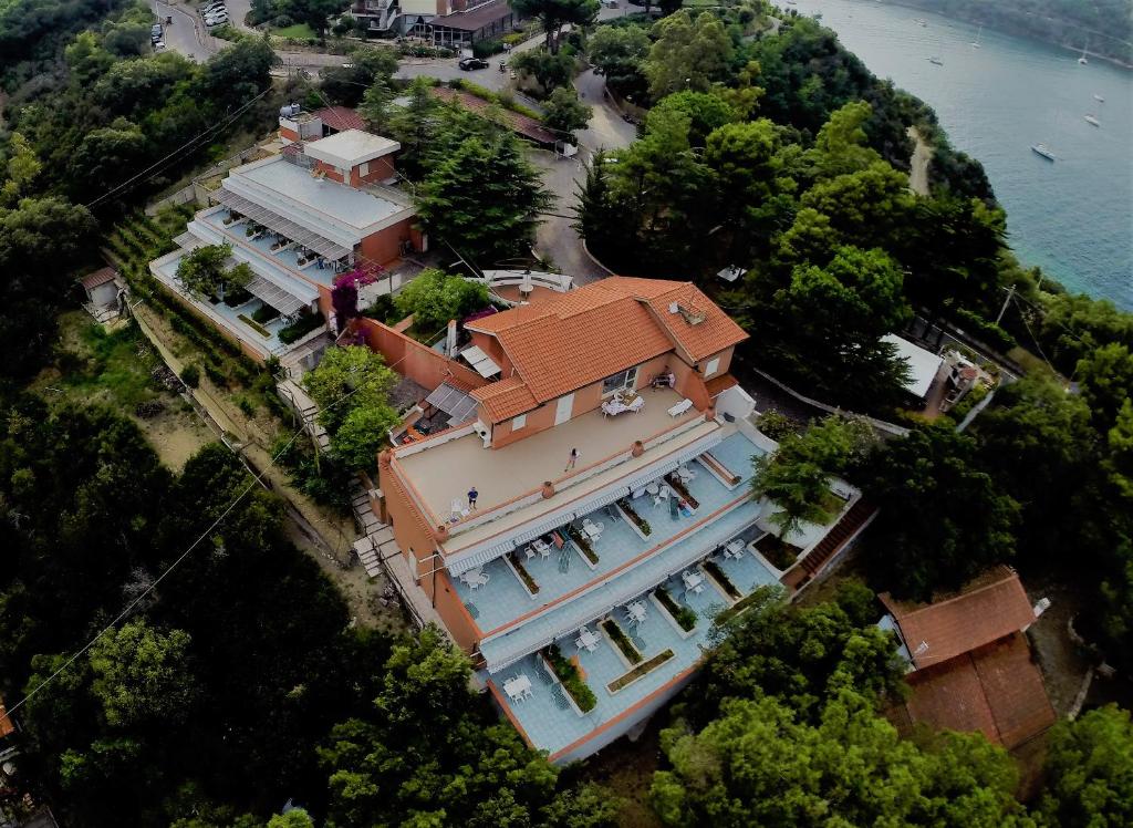 an aerial view of a large building with a house at Elba Residence in Capoliveri