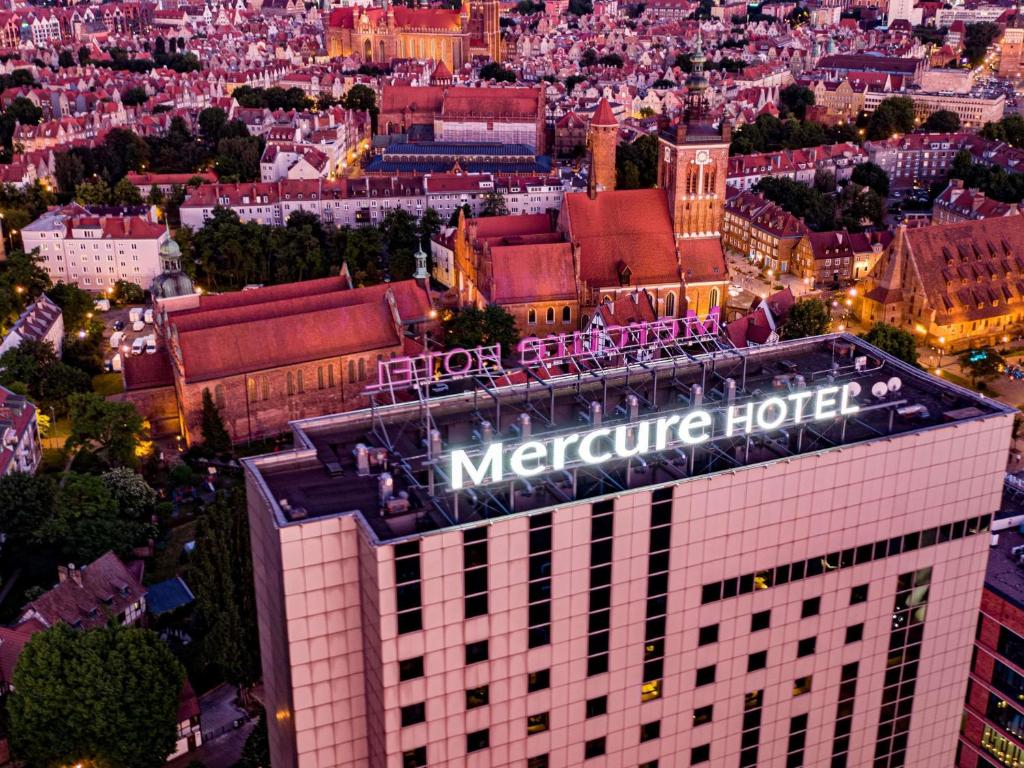 an aerial view of the melbourne hotel at night at Mercure Gdańsk Stare Miasto in Gdańsk
