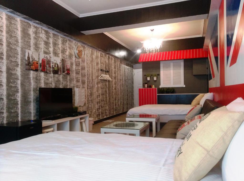 Postel nebo postele na pokoji v ubytování Summer Kenting B&B