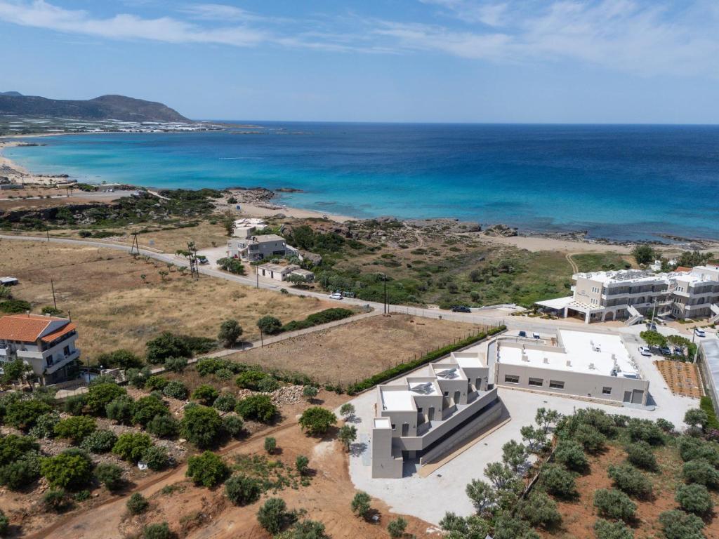 an aerial view of a building next to the ocean at Falasarna Bay Hotel in Falasarna