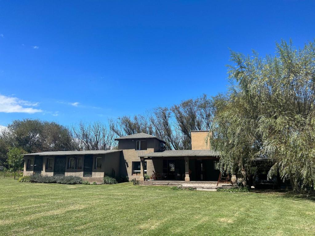 a house with a large yard in front of it at Rest has a name: Munay in Tafí del Valle
