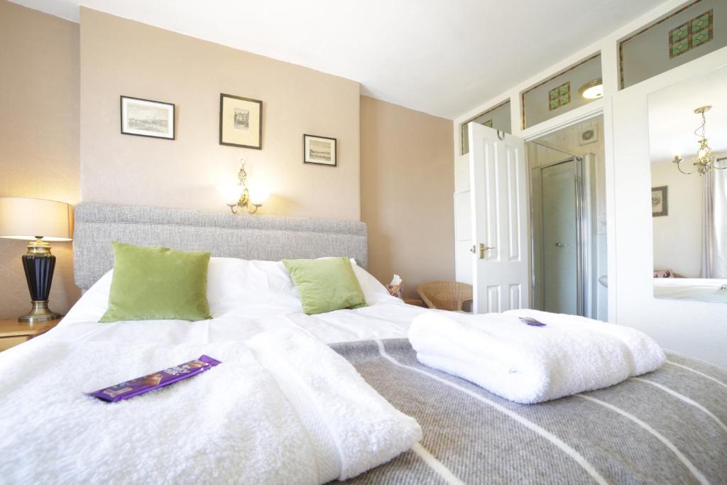 Postel nebo postele na pokoji v ubytování Sunrise Guest House