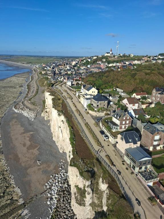 an aerial view of a beach with houses and buildings at La Bournonville in Ault