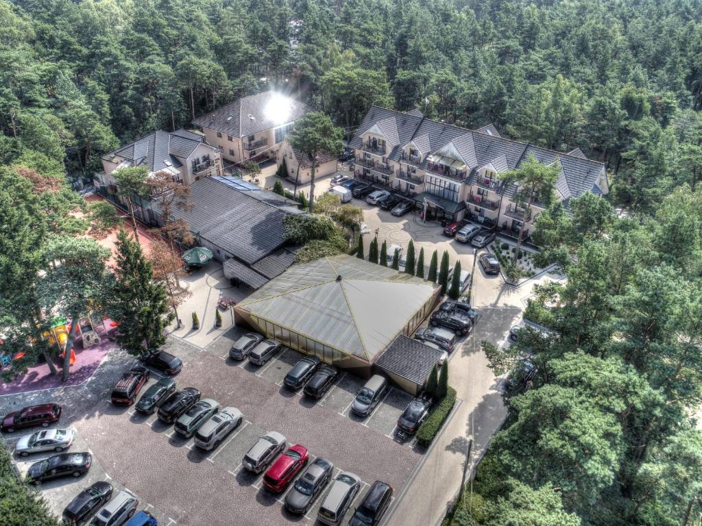 an aerial view of a parking lot at a resort at Pensjonat PISZ in Pobierowo