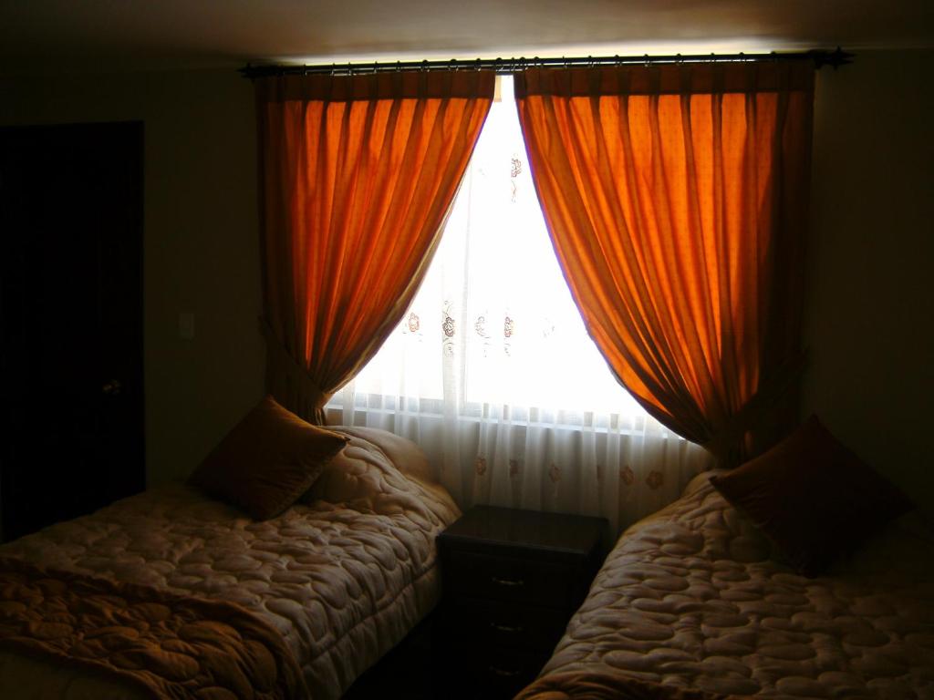 Postel nebo postele na pokoji v ubytování Hostal Fevilamir