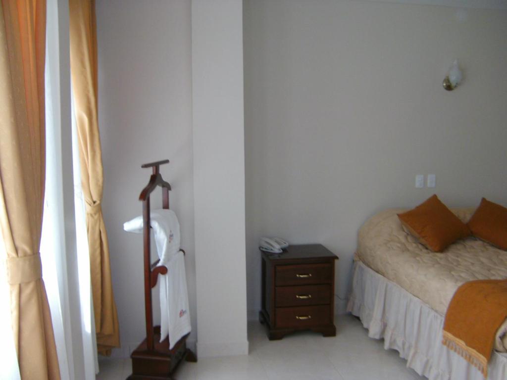 Postel nebo postele na pokoji v ubytování Hostal Fevilamir