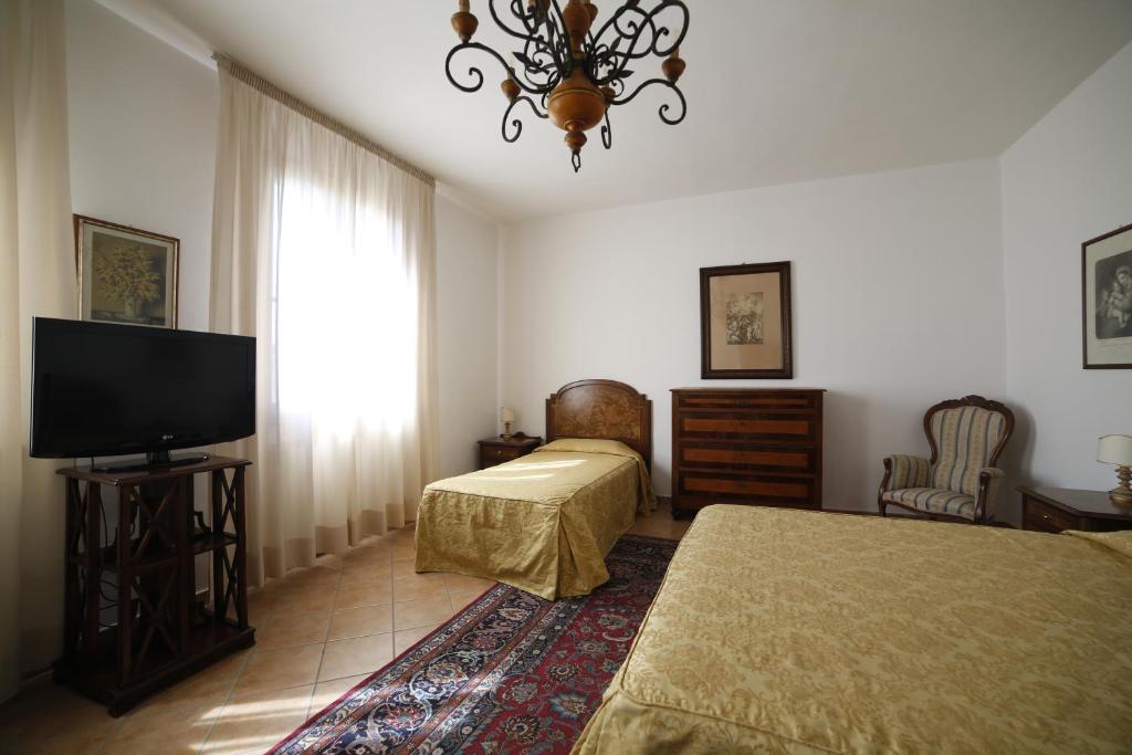 Łóżko lub łóżka w pokoju w obiekcie Hotel Luna
