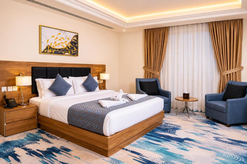 The Proud Hotel Al Khobar - Deluxe Zimmer Mit Kingsize-Bett