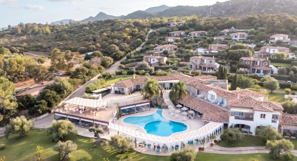 an aerial view of a house with a swimming pool at Nicolaus Prime Villas Resort in Costa Rei