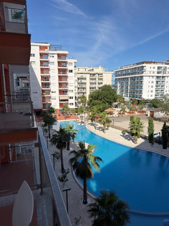 a view of a large swimming pool in a city at Shengjin Paradise Apartment in Shëngjin