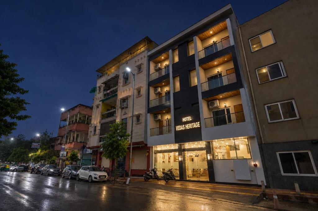 a building on a city street at night at Hotel Vedas Heritage - Karol Bagh - Newly Renovated in New Delhi