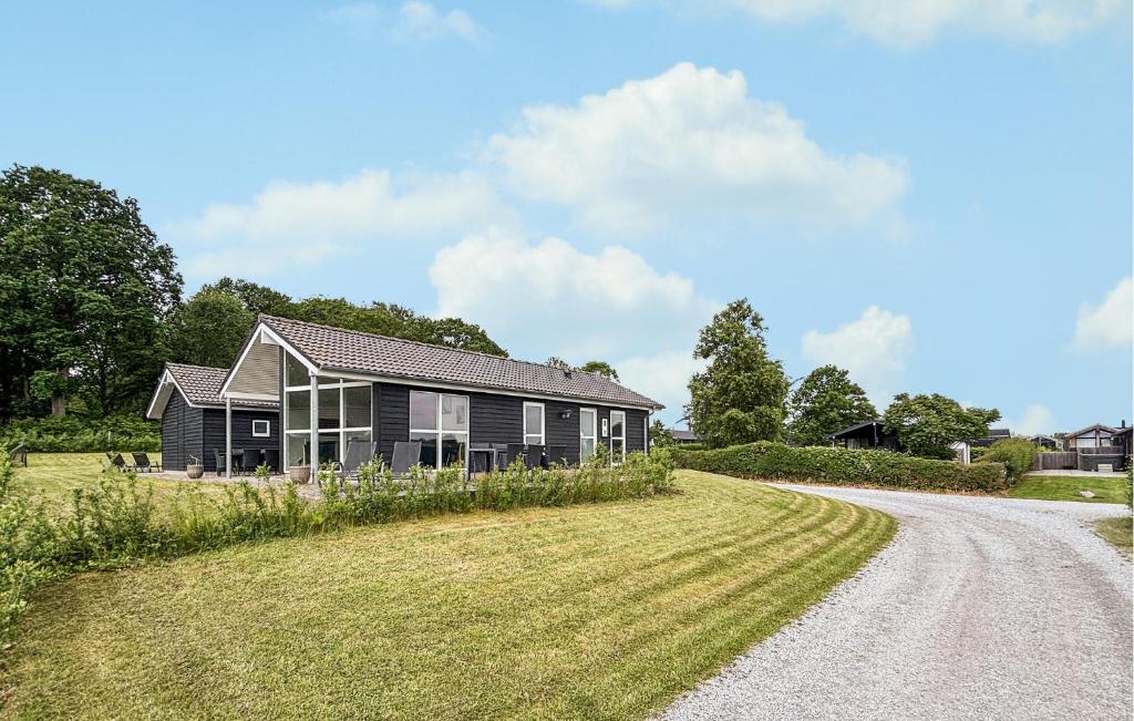a house on the side of a road at Nice Home In Haderslev With Sauna in Haderslev