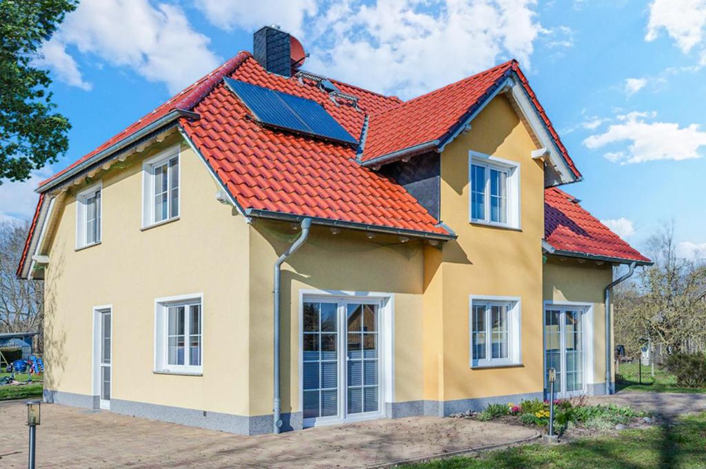 a house with an orange roof at Ferienhaus Ulme in Kachlin