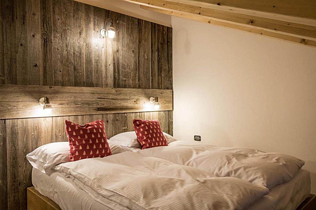 Postel nebo postele na pokoji v ubytování Residence Hotel K2
