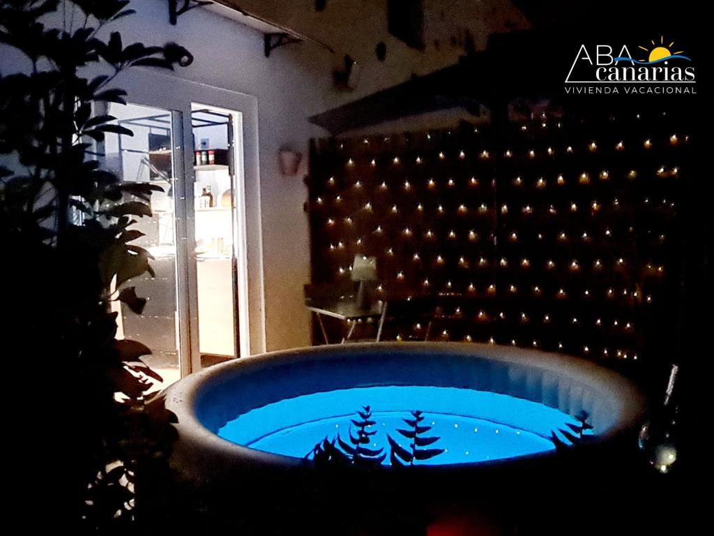 a blue tub with trees in it in a room at Abadog Canarias in Firgas