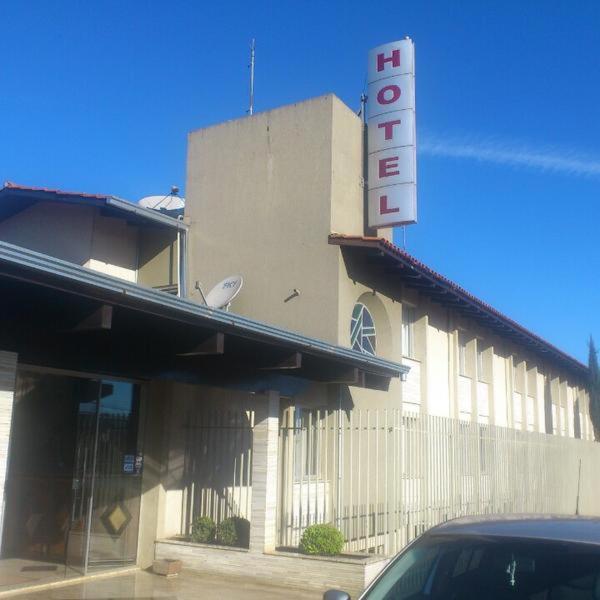 a building with a sign on the side of it at Ancelf Express in Palmas