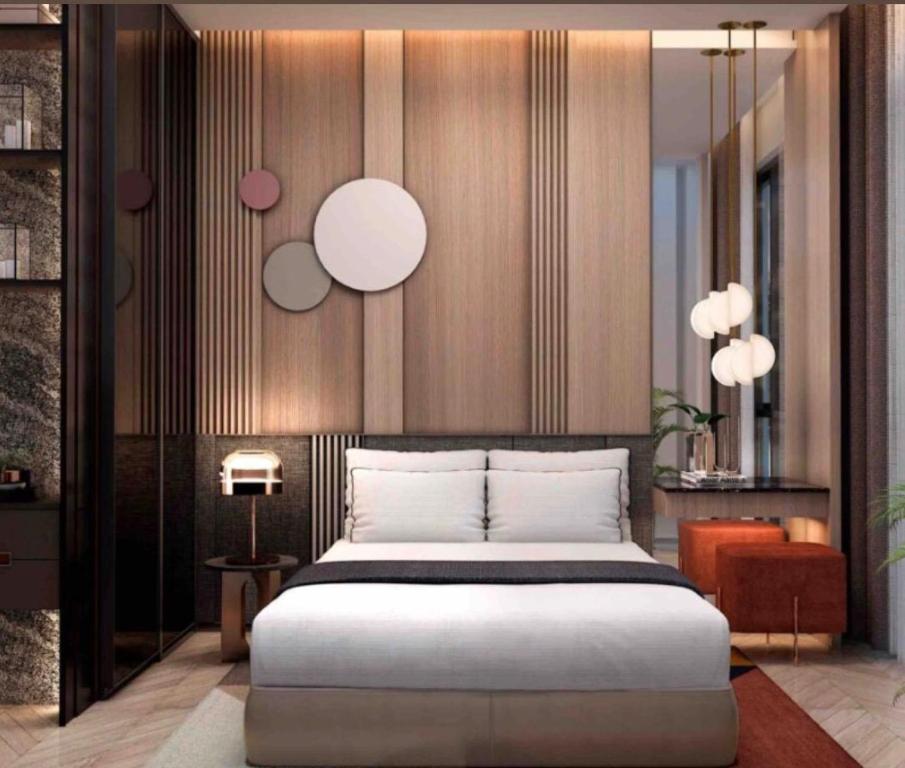 a bedroom with a large bed in a room at Aahotel by ABCIS in Phước Mỹ