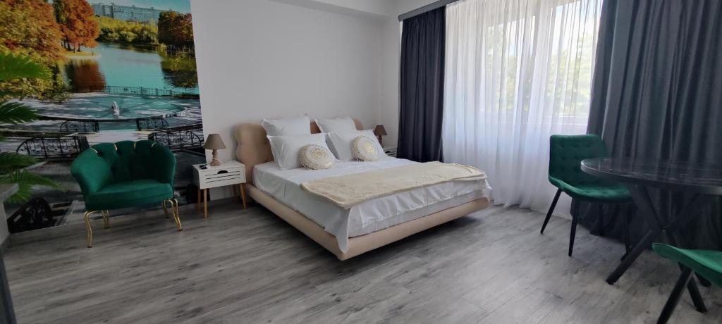 Katil atau katil-katil dalam bilik di Cathedral Bucharest Suites
