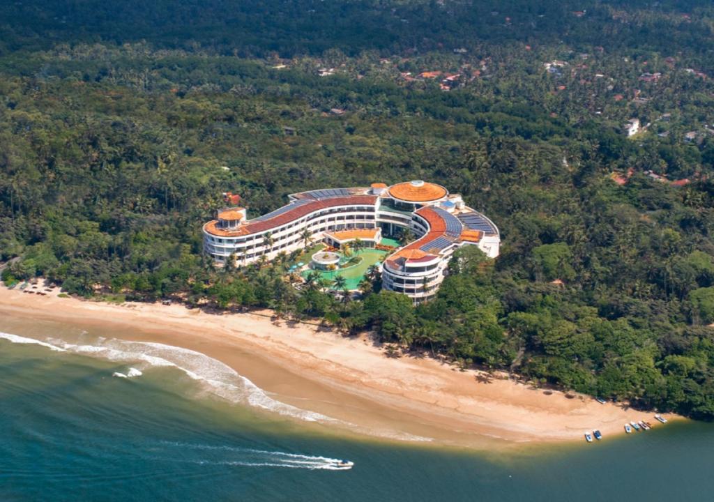 an aerial view of a resort on a beach at The Eden Beruwala in Bentota