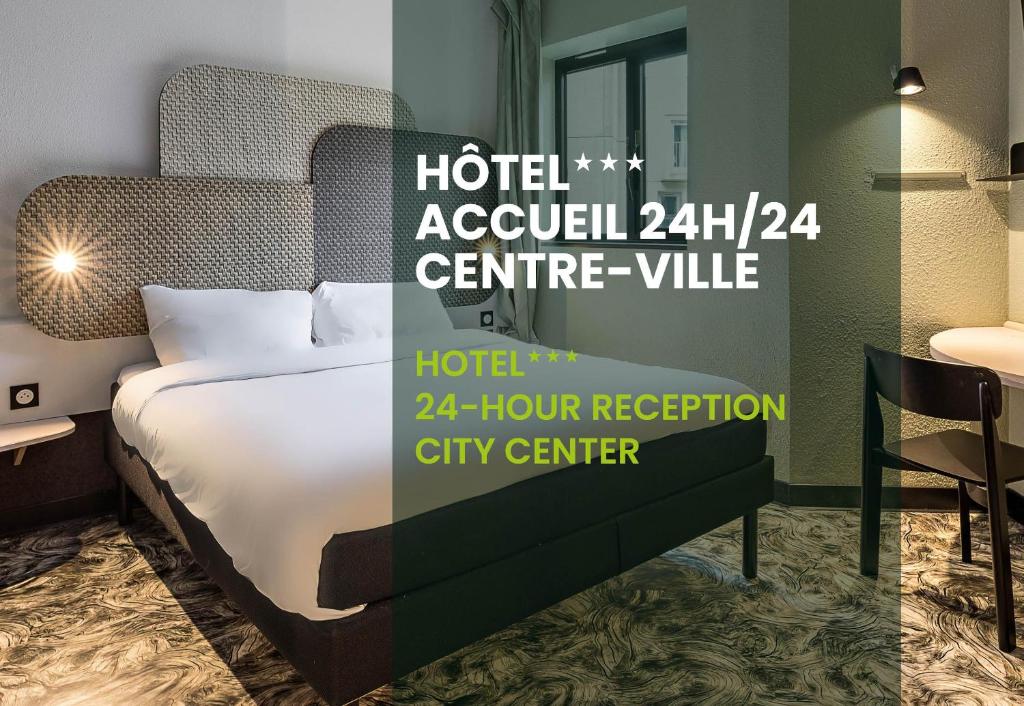 a hotel room with a bed and a sign that reads hotel acell centre at B&B HOTEL Rouen Centre Rive Gauche in Rouen