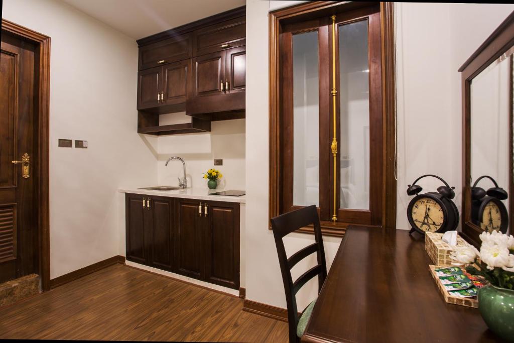 Kuchyň nebo kuchyňský kout v ubytování Maro Hotel