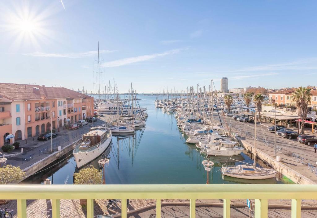 a group of boats docked in a harbor at B&B HOTEL Martigues Port-de-Bouc in Port-de-Bouc
