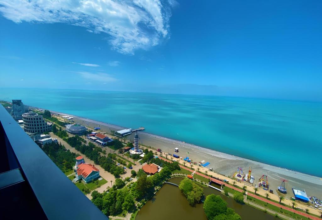 an aerial view of a beach and the ocean at Panorama Batumi Black Sea View in Batumi