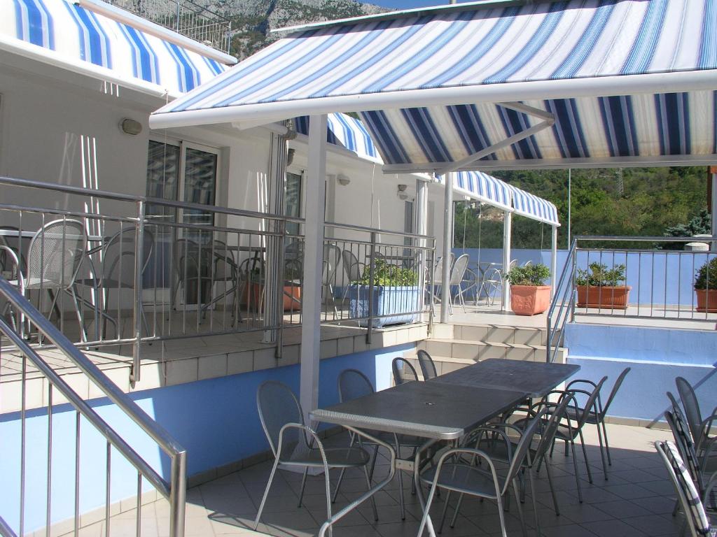 Patio alebo iná vonkajšia časť ubytovania Aparthotel Pecic