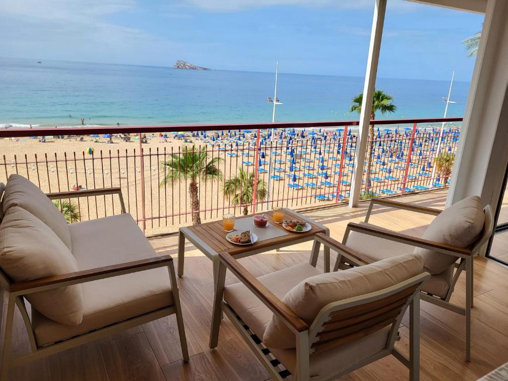 a balcony with a view of the beach at Levante Frontline Luxury Duplex 5 Bedrooms in Benidorm