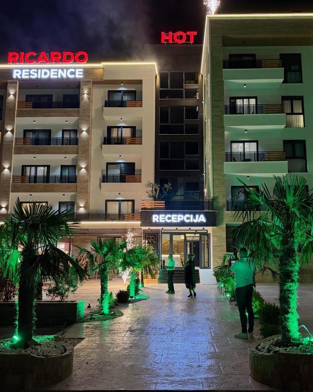 a group of people standing in front of a hotel at Hotel Ricardo Residence in Ulcinj