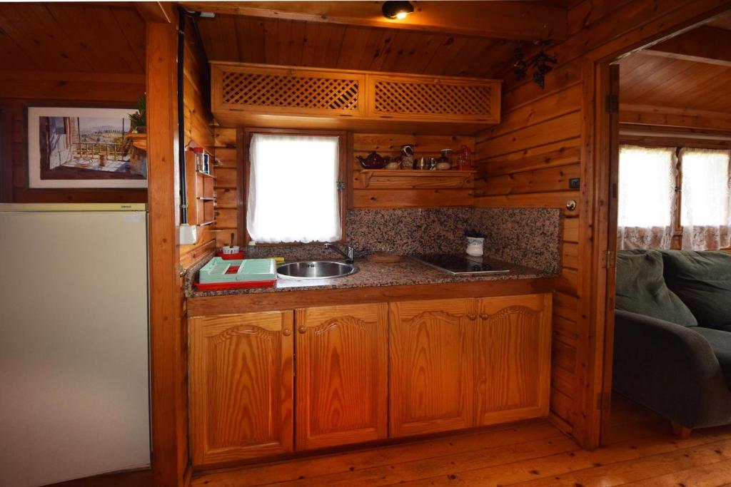 Kuchyňa alebo kuchynka v ubytovaní Casa Canarina