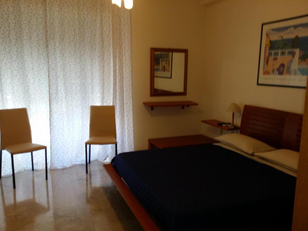 Łóżko lub łóżka w pokoju w obiekcie Aparthotel TURNONE