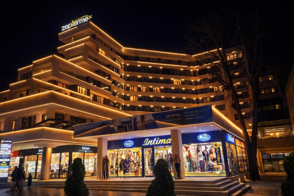 a store in front of a building at night at RELAX-zepter in Vrnjačka Banja