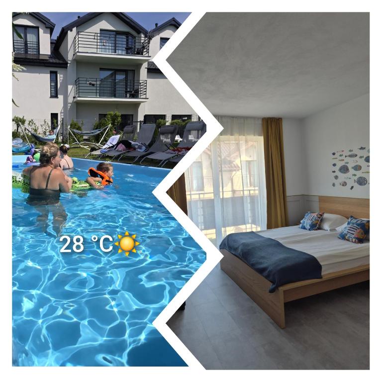 a family playing in a swimming pool in a hotel room at Willa Kardamon in Władysławowo