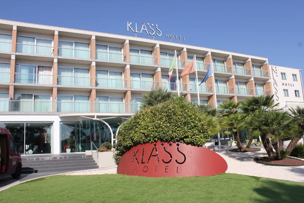 a sign in front of a hotel at Klass Hotel in Castelfidardo