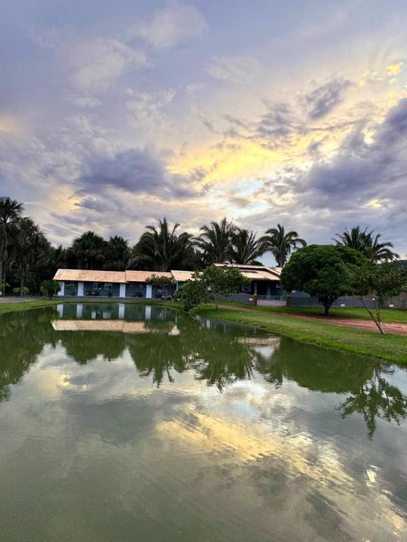 a large body of water in front of a building at casa completa Paraiso valle verde in Estivado