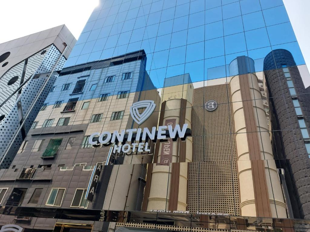 a building with the hyundai sign on it at Daejeon Continew Hotel in Daejeon