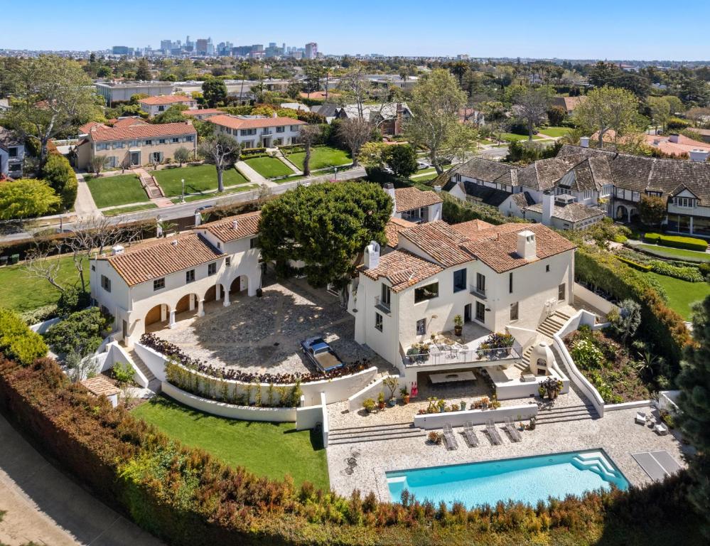 an aerial view of a mansion with a swimming pool at Howard Hughes Estate in Los Angeles