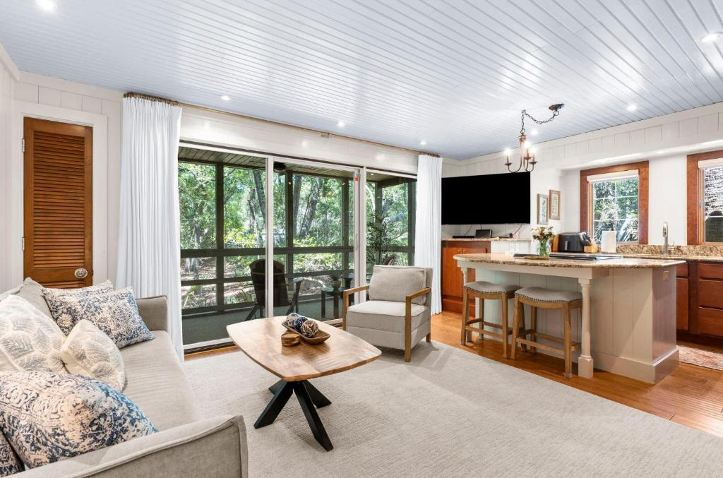 a living room with a couch and a table at 3584 Shipwatch Rd in Kiawah Island