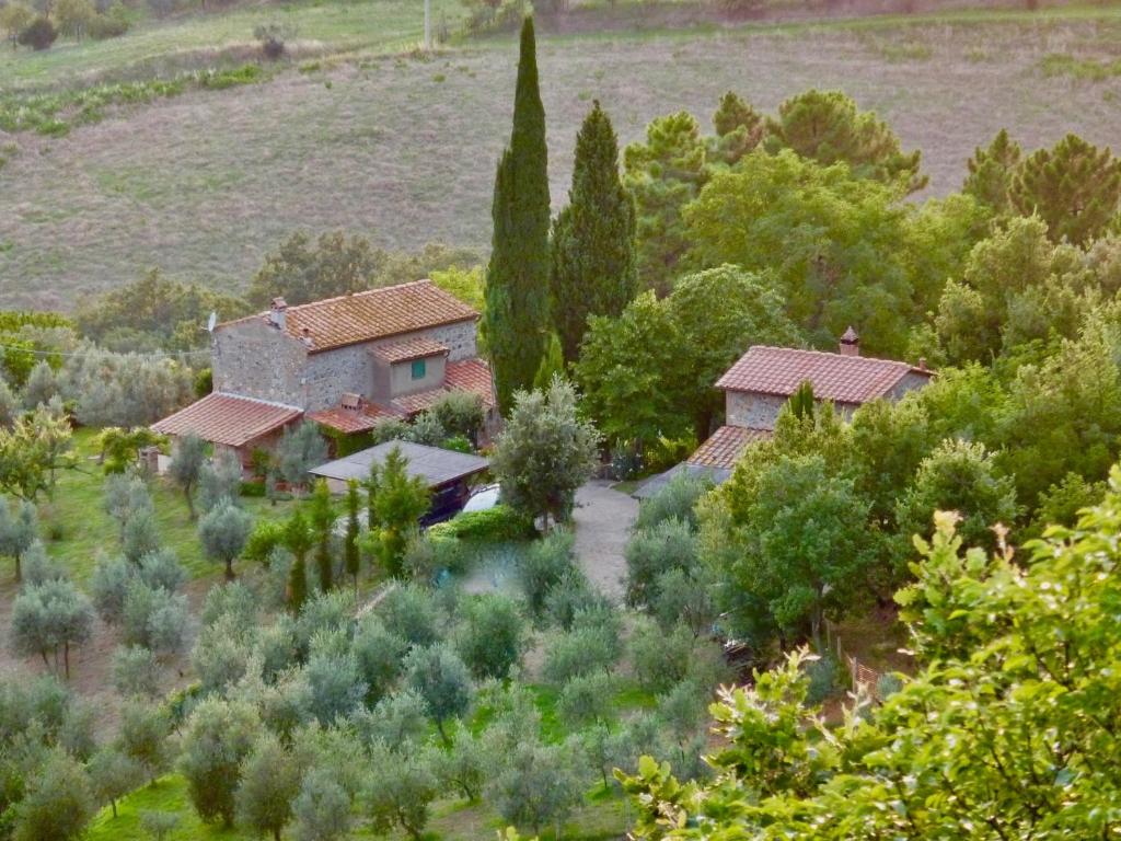 an aerial view of a house in a field at Casa della Madonna in Montaione