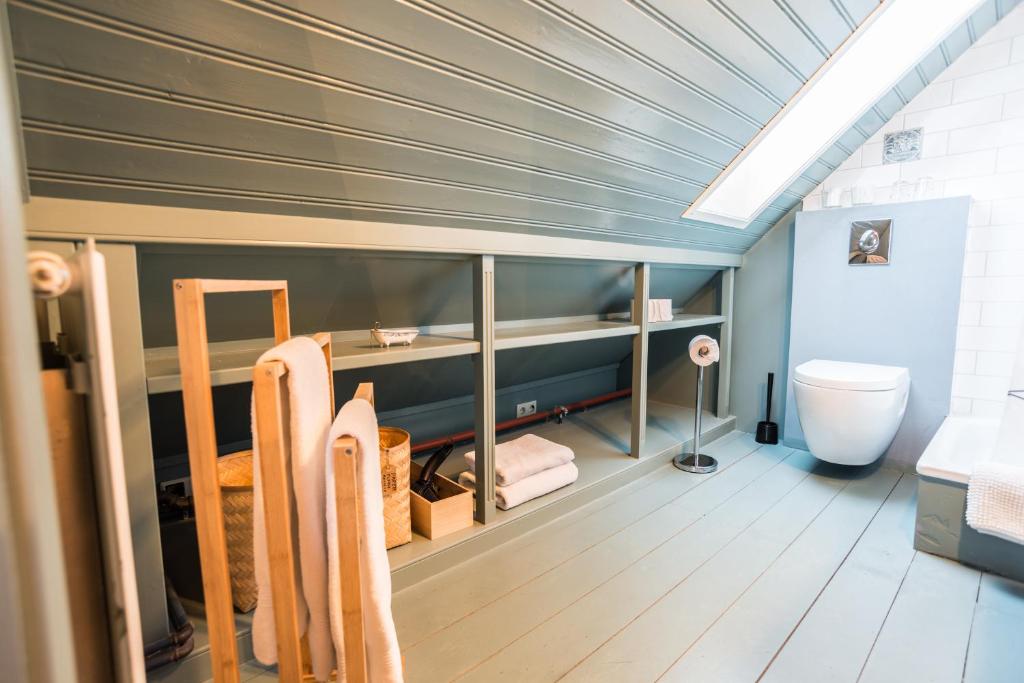 Postel nebo postele na pokoji v ubytování Reykjavík Treasure B&B