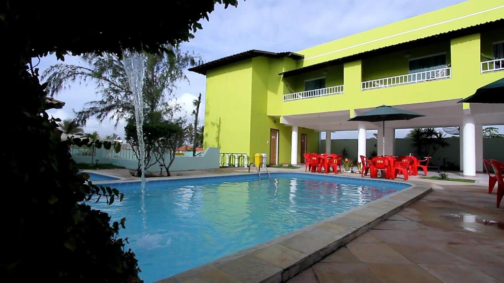 Bazén v ubytování Hotel Pousada Oasis nebo v jeho okolí