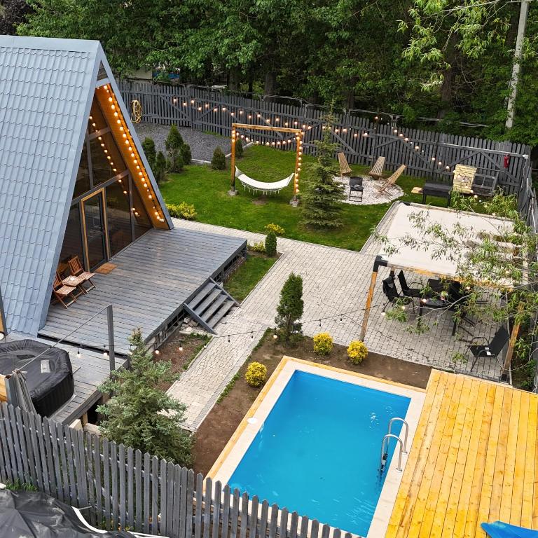an aerial view of a backyard with a swimming pool at Scandinavia A-Frame in Akhundov