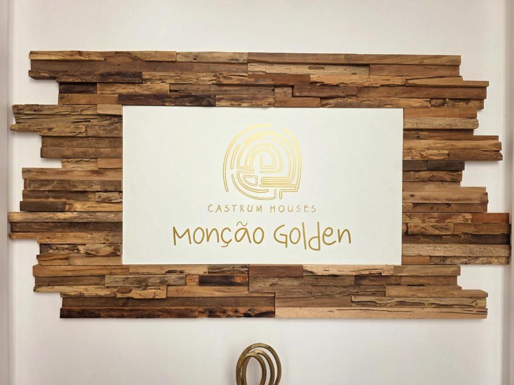 a sign for a morocco golden restaurant on a wall at Monção Golden I I in Monção