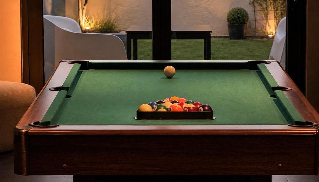 a pool table with a ball on top of it at Downtown Velvet Loft in Brussels