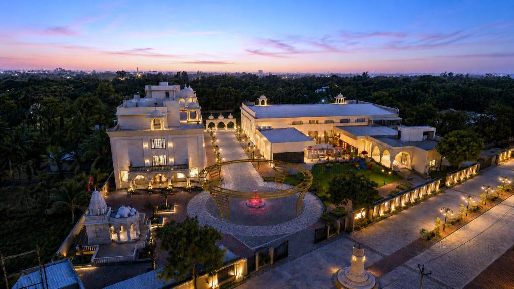 an aerial view of a building at night at Haldi Kumkum Resort in Limodra