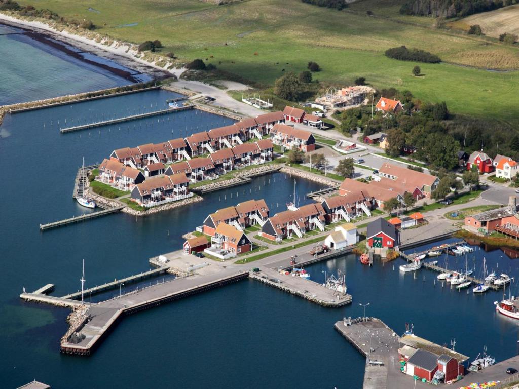 an aerial view of a marina with boats in the water at Møn - Klintholm Harbour in Borre