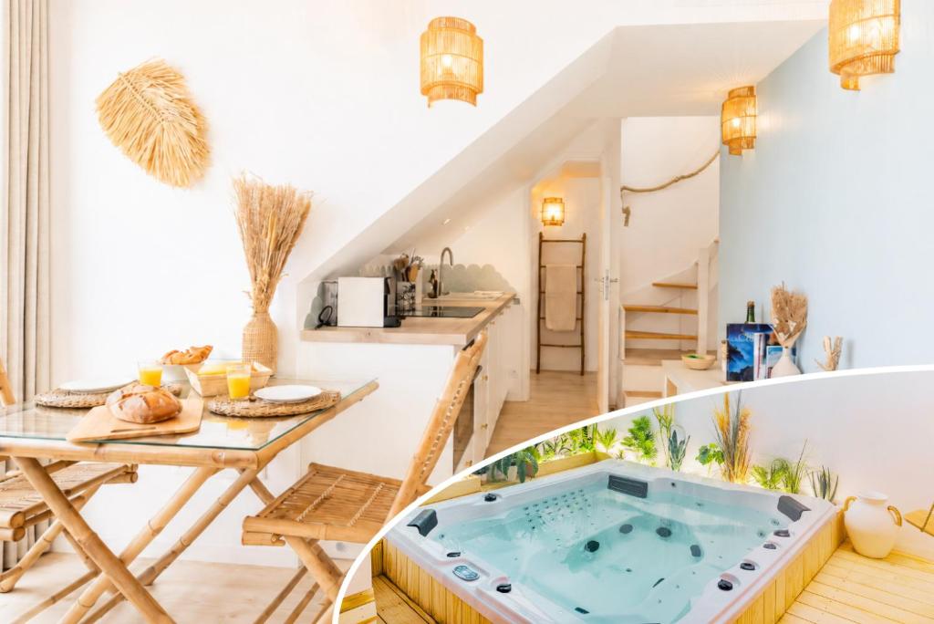 a kitchen and living room with a hot tub at Appart'Hôtel & Spa "Les Voiles" Le Houat in Carnac